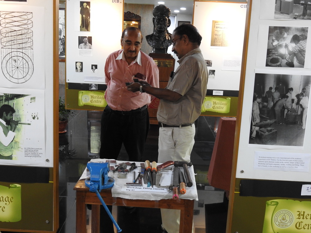 Mr. Kumaran Sathasivam showing a piece of workshop exercise to Dr, Ajit Singhvi at Heritage Centre.