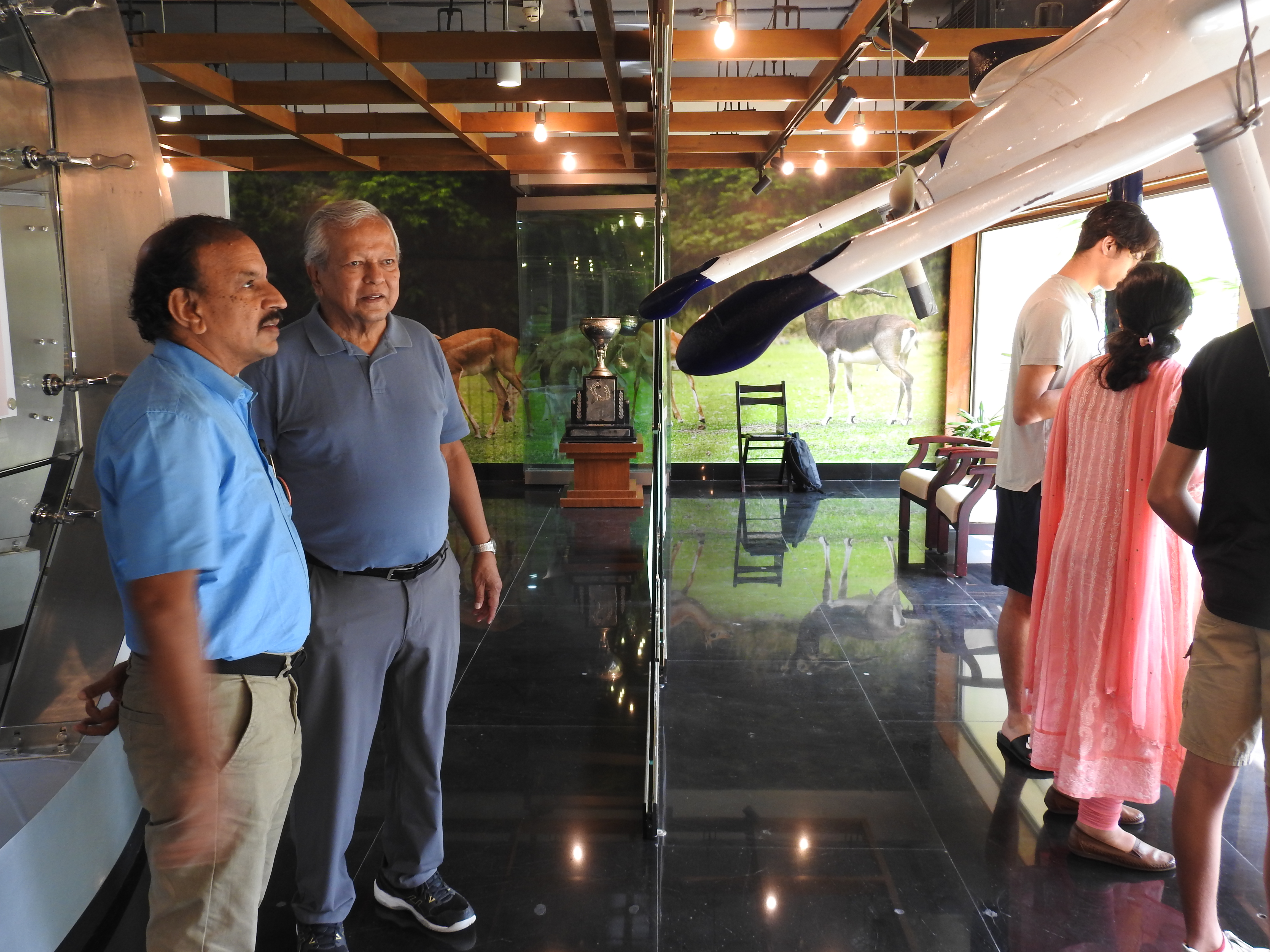 Mr. Kumaran Sathasivam and Mr. Lionel Paul taking a look at an exhibit at the Heritage Centre.