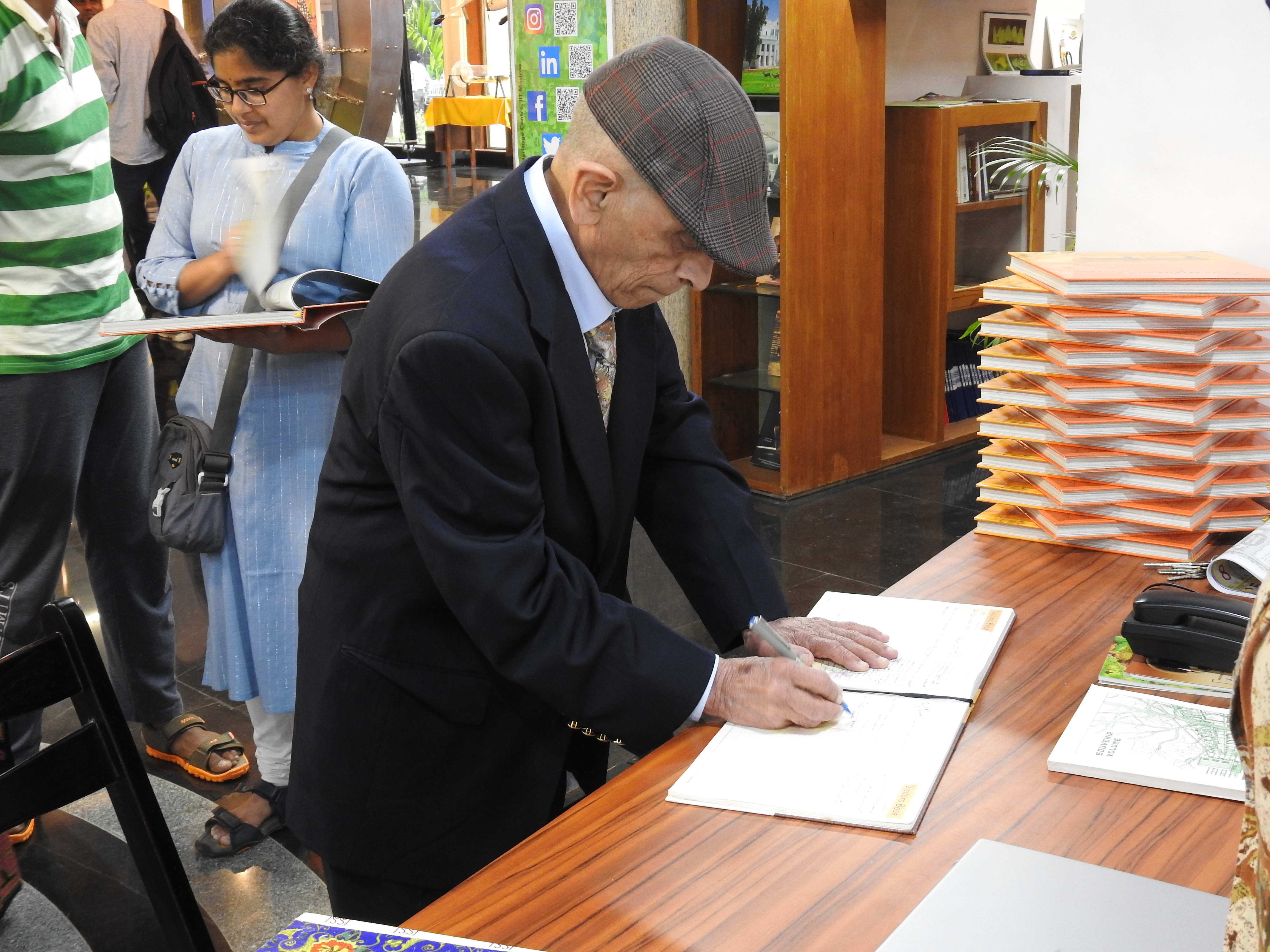 Mr. S. S. Mani Venkata signs the Visitors' Book