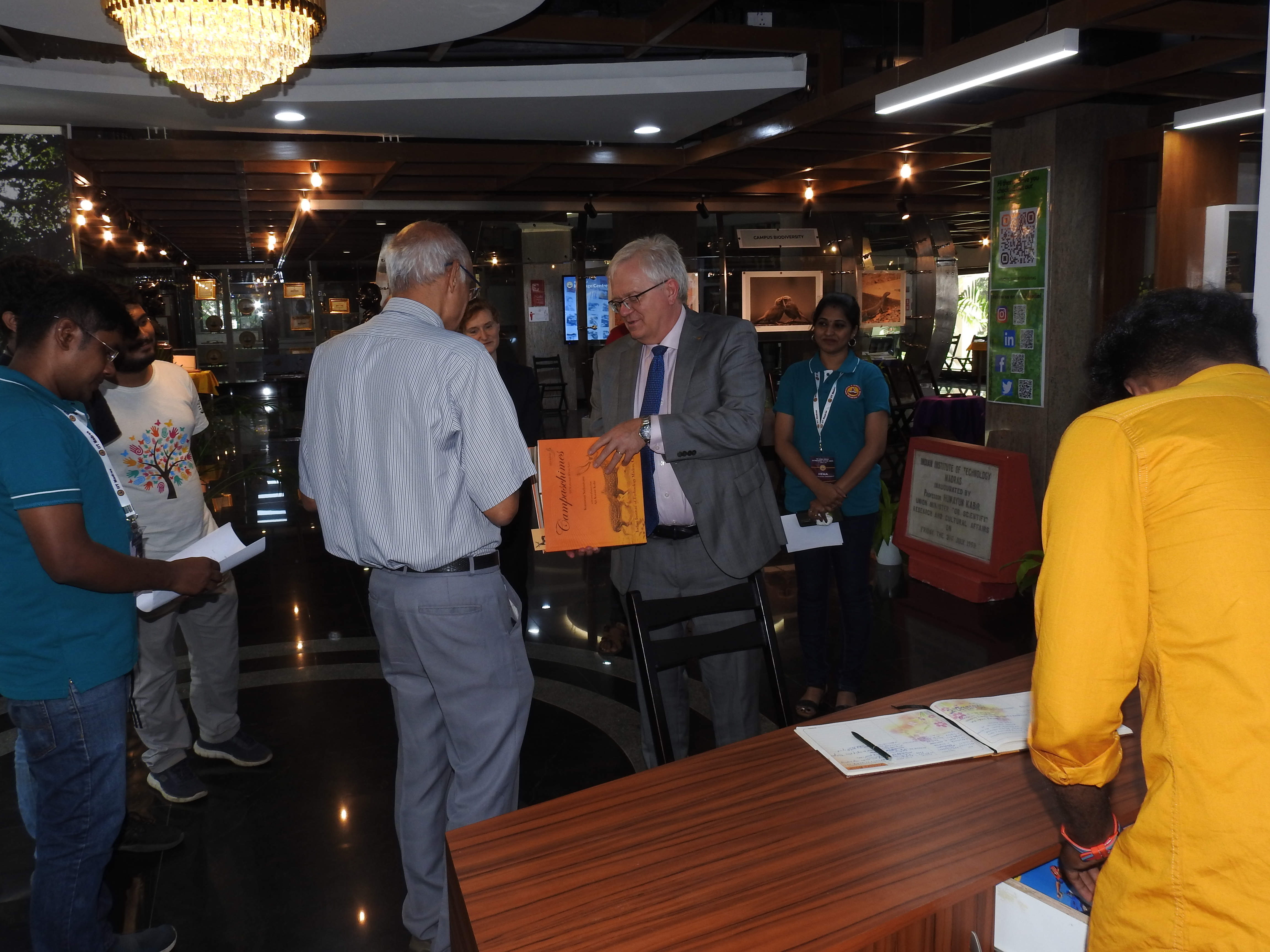 Prof. Schmidt receives a copy of Campaschimes, a coffee table book on the history of IIT Madras