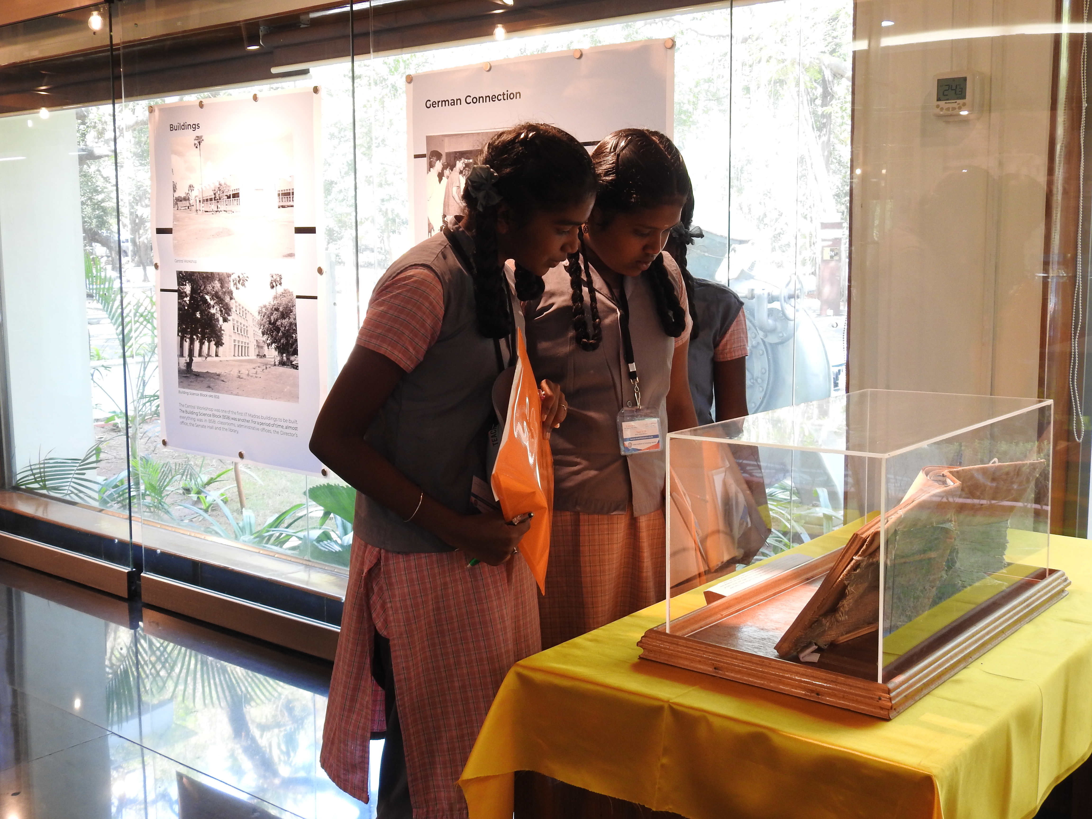 Students discuss an exhibit at the Heritage Centre