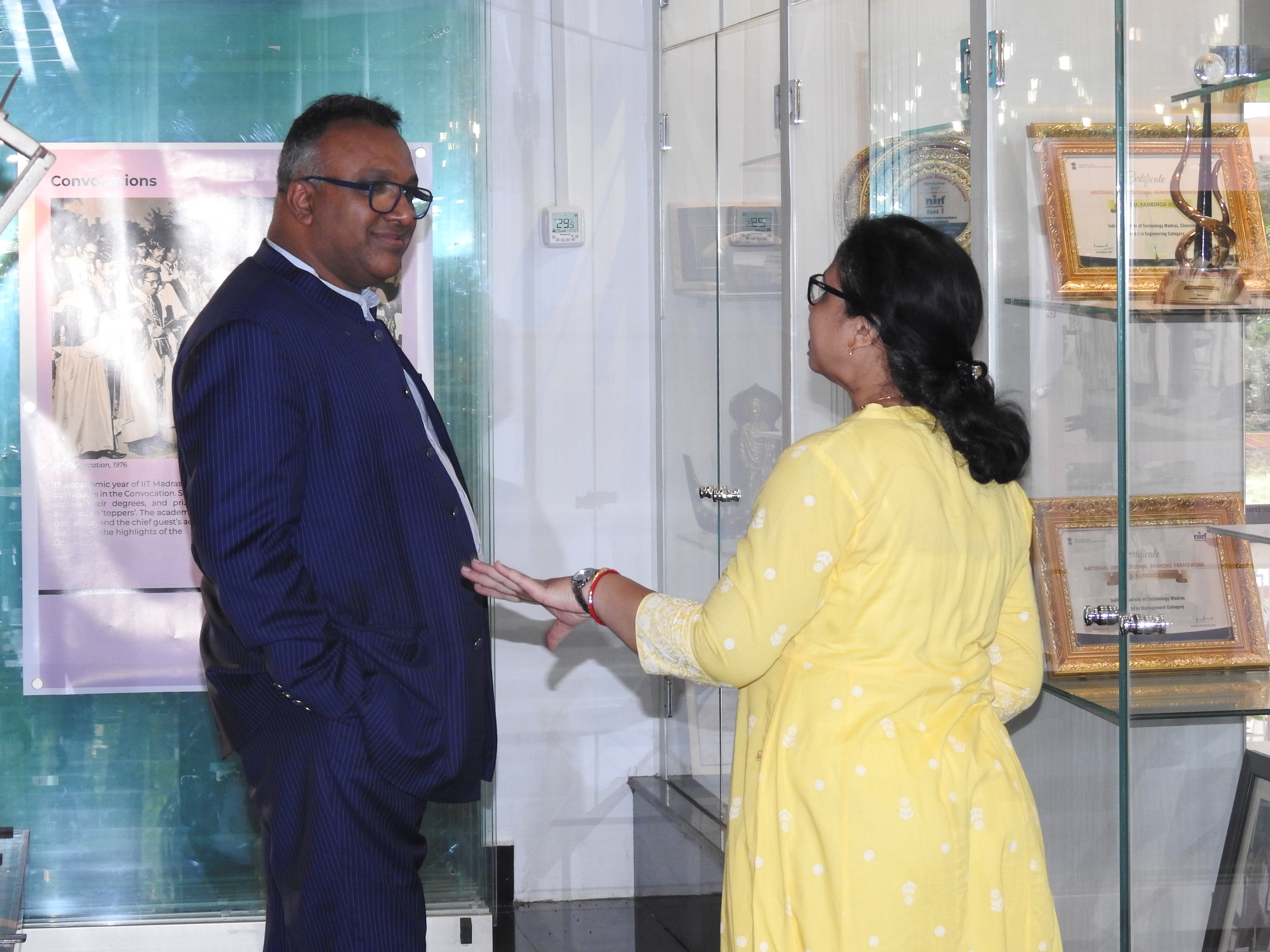 Ms. Mamata Dash explains the NIRF Ranking exhibit to Prof. Dr. C. Raj Kumar