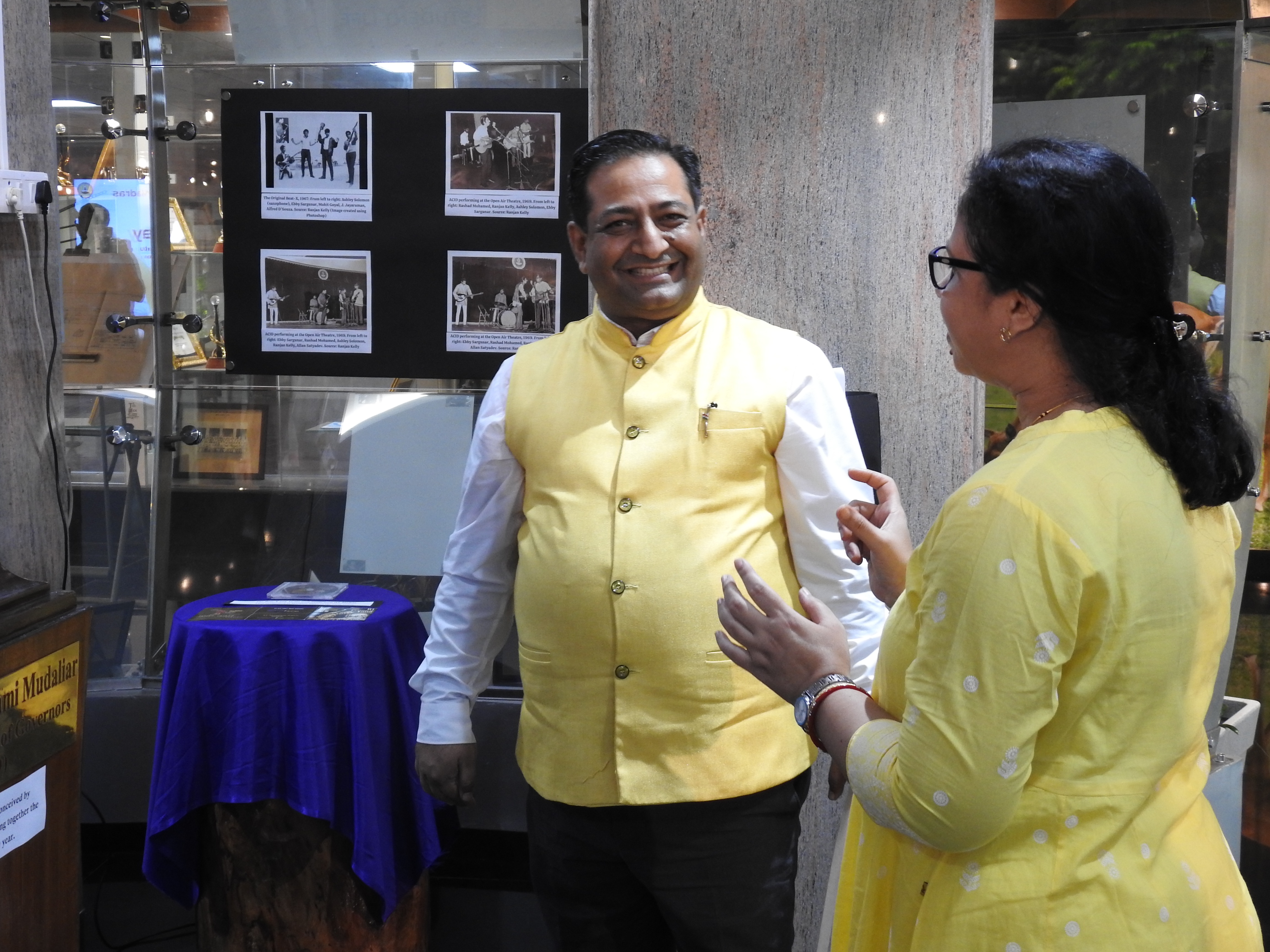 Ms. Mamata Dash escorts a member of the O.P. Jindal Global University around the Heritage Centre