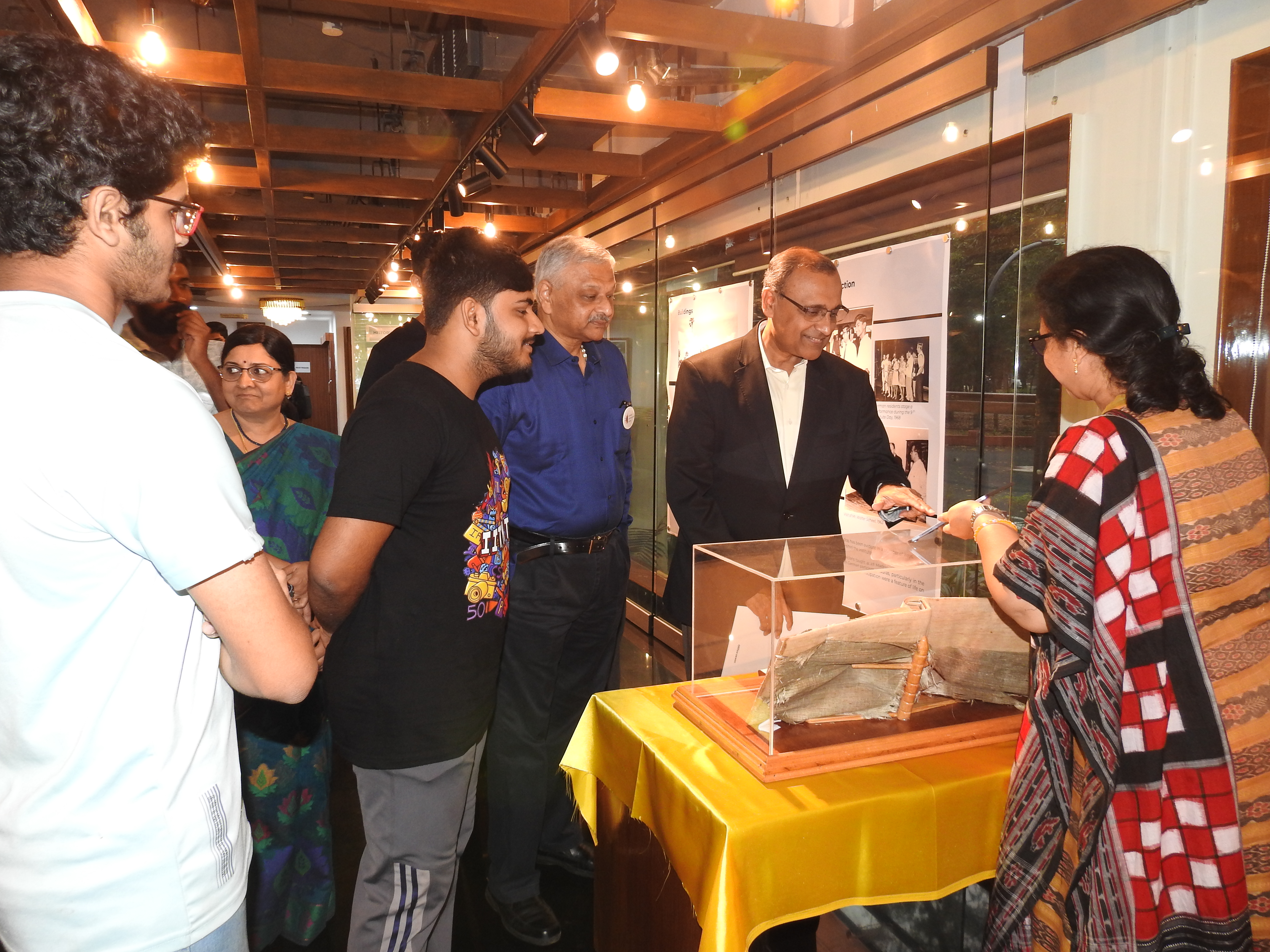 Mr. T. S. Tirumurti takes a look at the Visitors' Book at the Heritage Centre