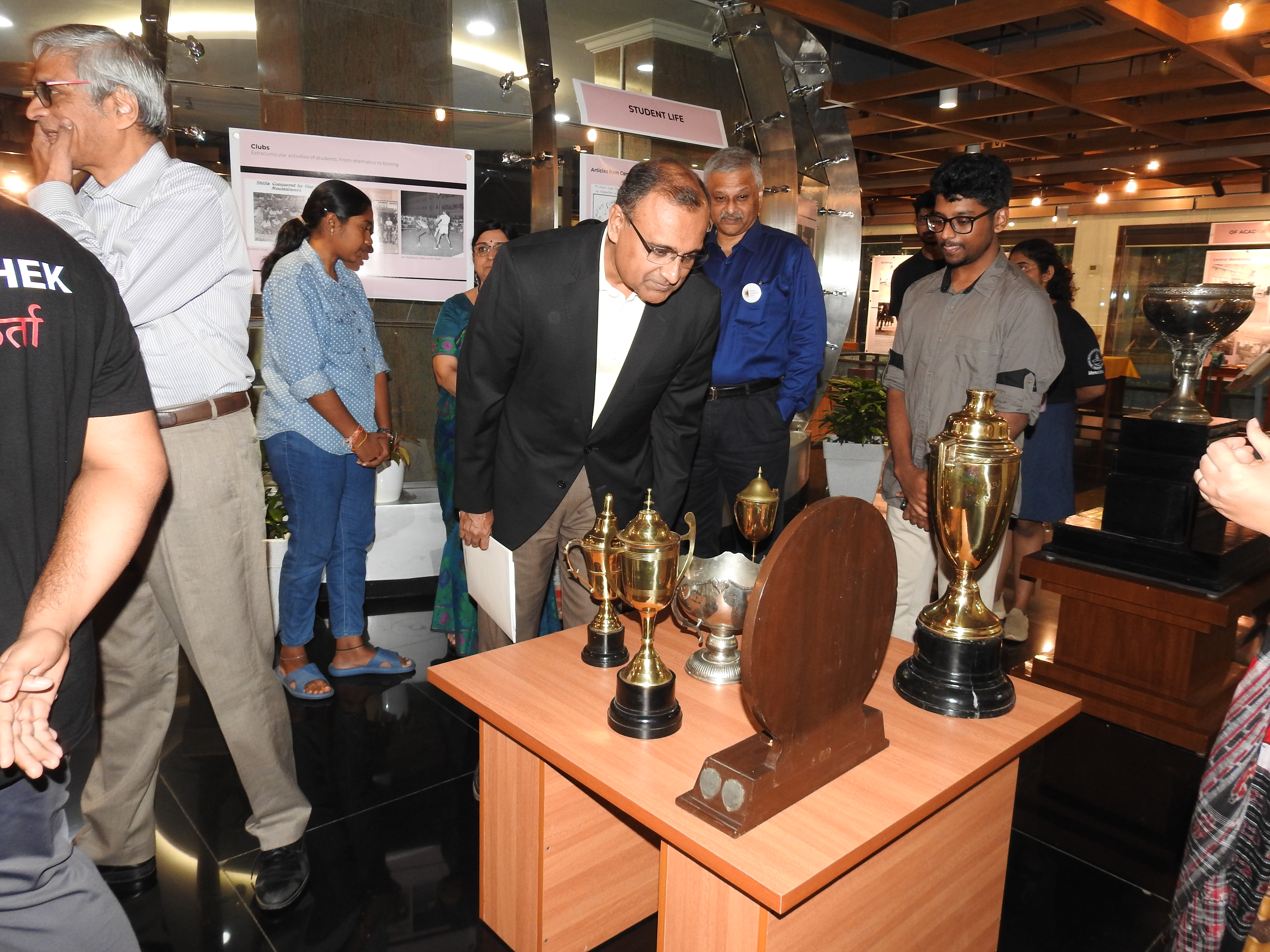 Mr. T. S. Tirumurti taking a look at trophies at the Heritage Centre