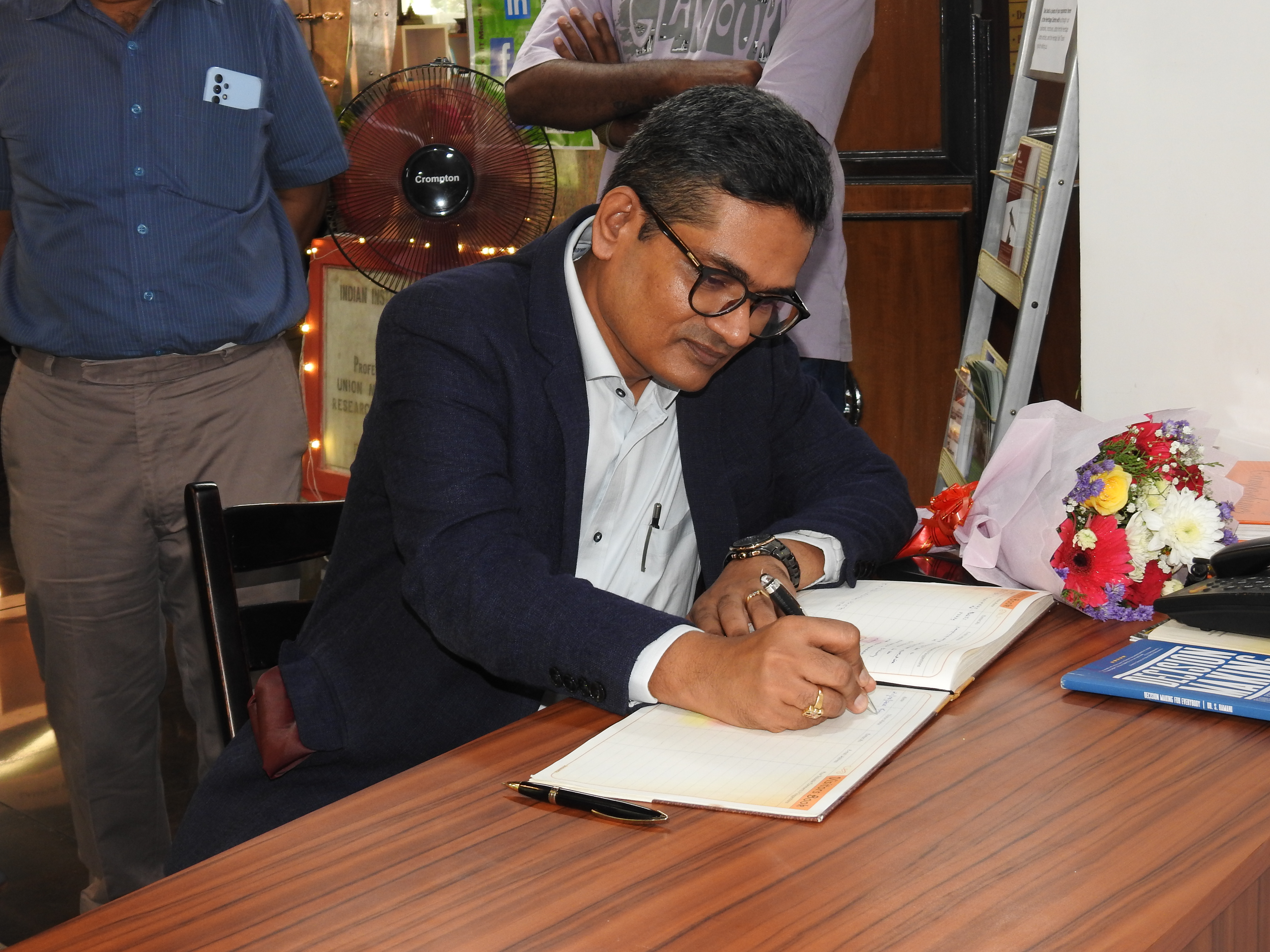 Mr. Krishnakumar Ramanathan signs the Visitors' Book at the Heritage Centre