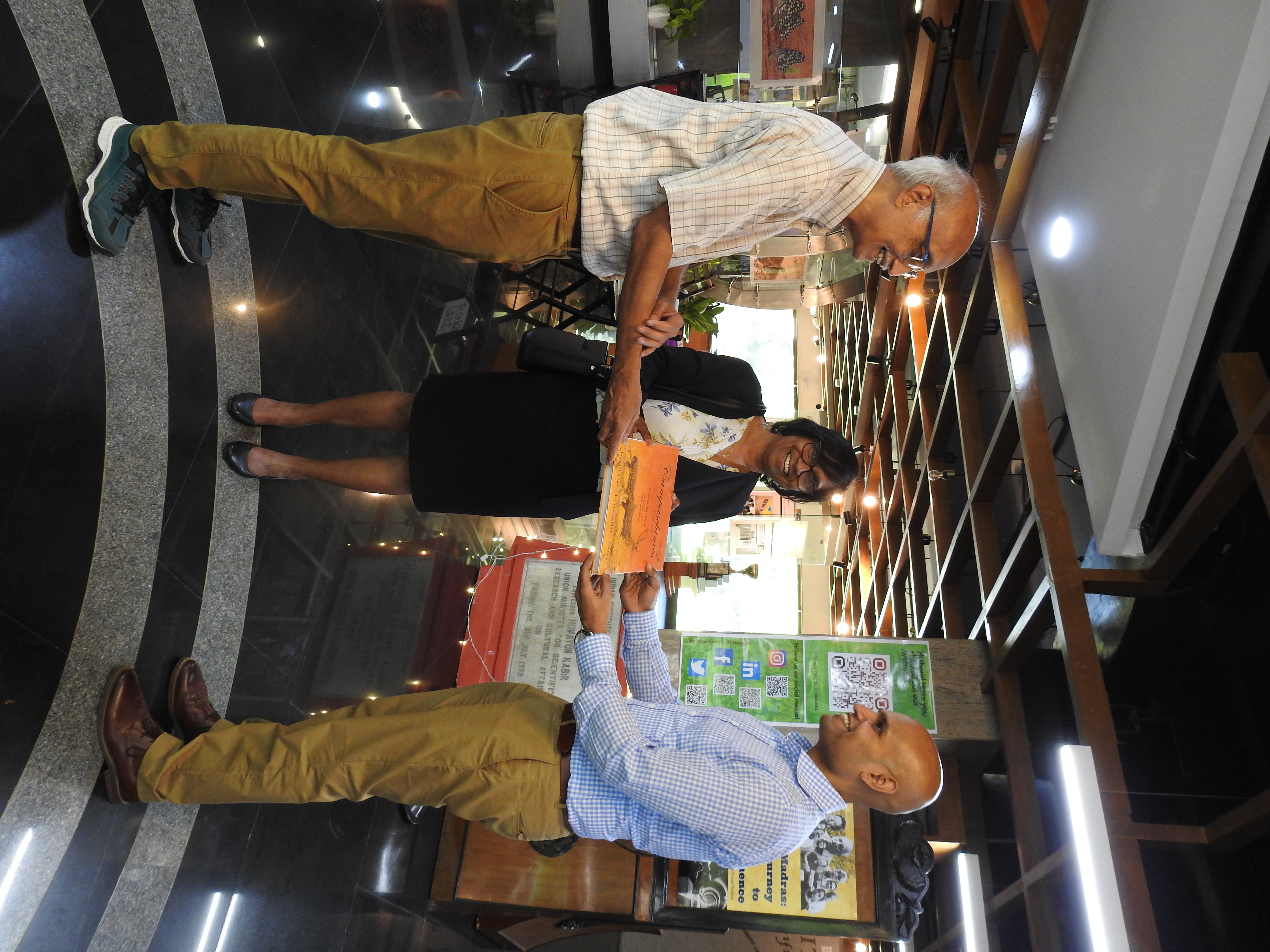 Prof. R. Nagarajan (Professor-in-charge of Heritage Centre, left) presents a copy of Campastimes to the visiting professors from Melbourne University