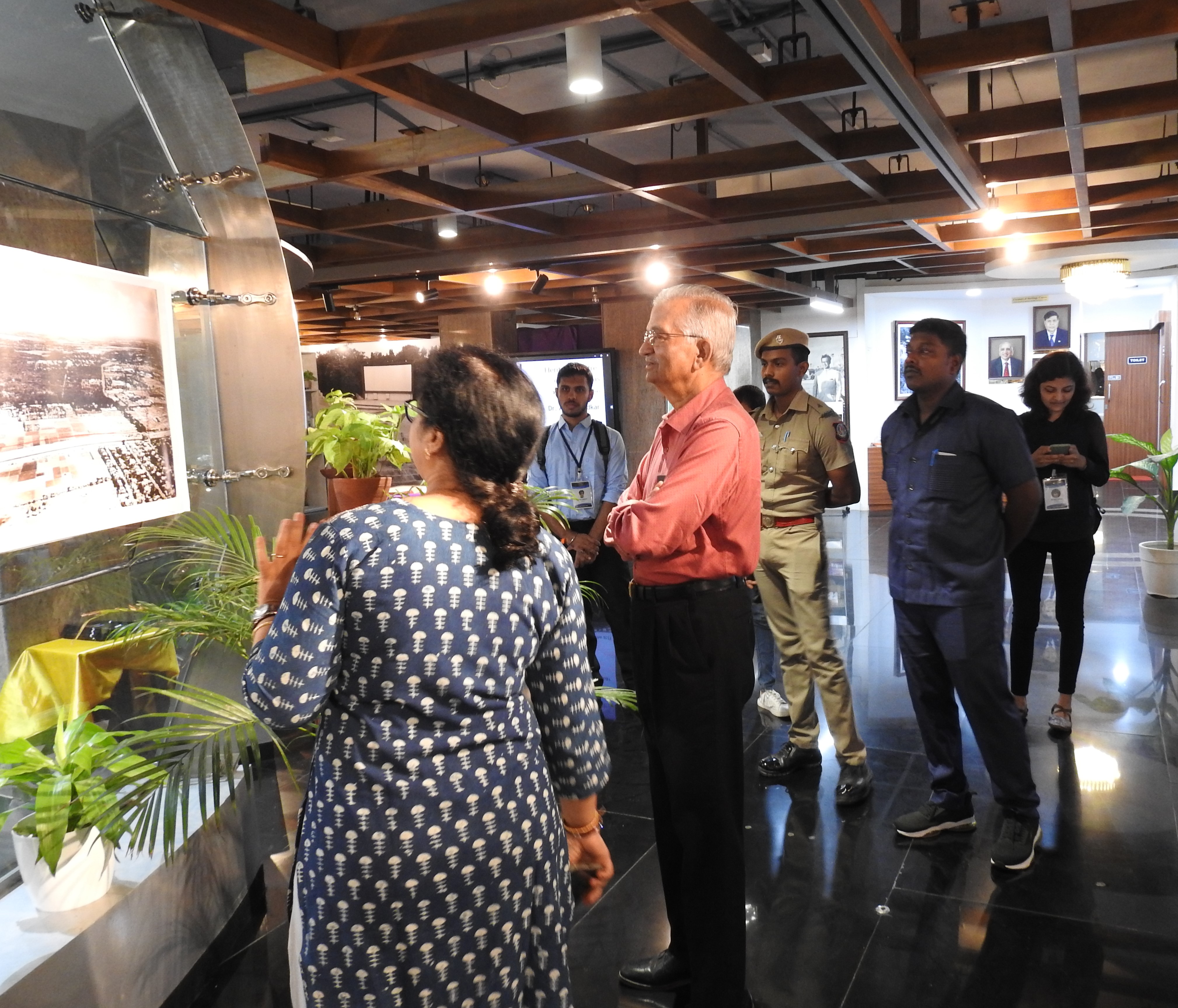 Dr. Kakodkar views the IITM site map, the details of which are explained by Ms. Mamata Dash (Senior Project Officer, Heritage Centre)