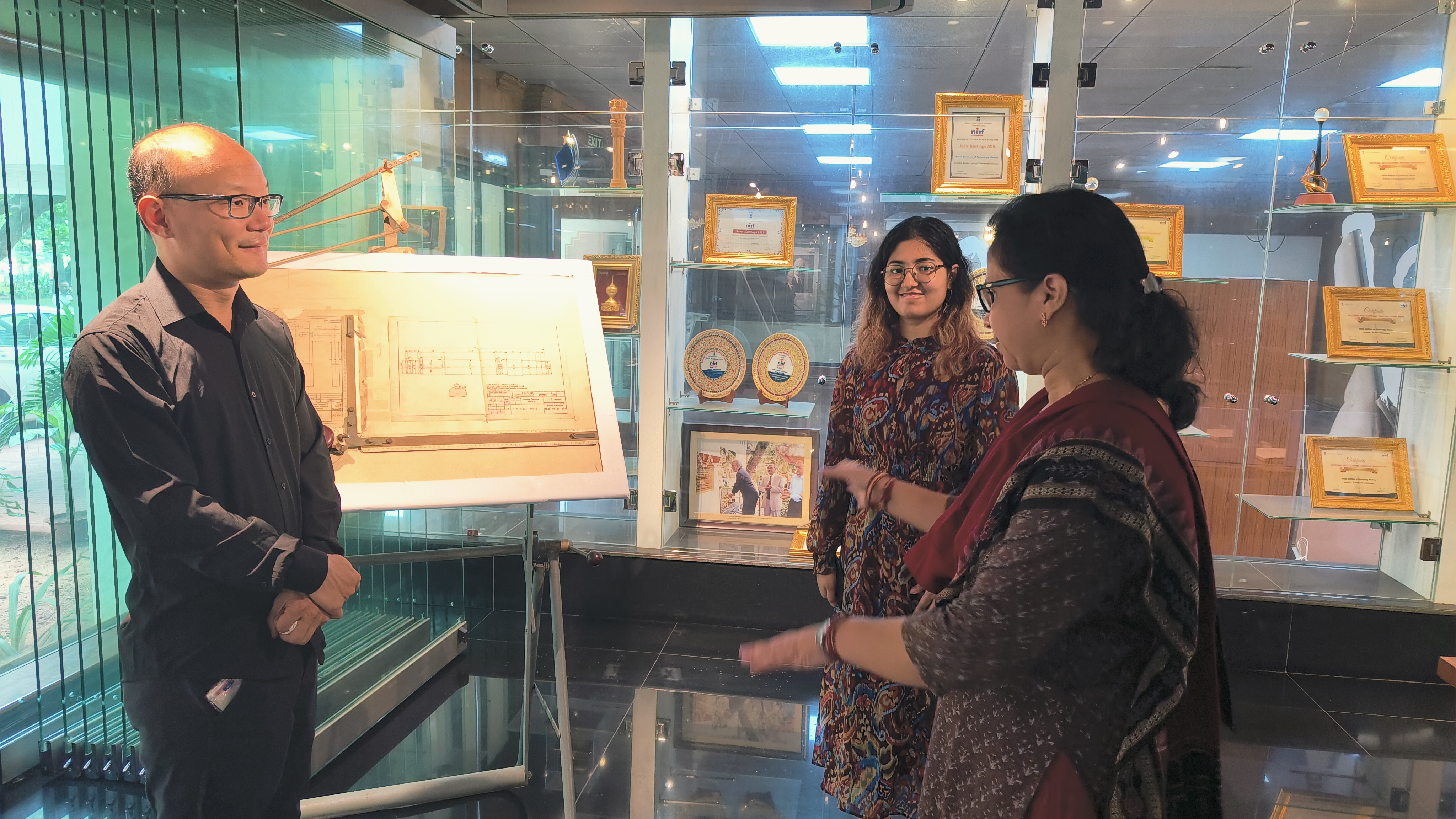 Professor Zhang is taken on the Heritage Centre tour by Ms. Mamata Dash (Senior Project Officer, right) and Ms. Ashlin Deena Mathews (Project Associate, centre)