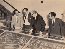 Prof. B. Sengupto uses a three-dimensional model to explain the development of the IIT Madras campus to visitors 