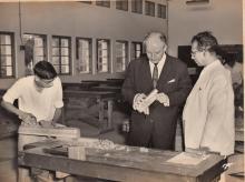 Mr. Walter Scheel and Prof. B. Sengupto examine a piece of wood at the carpentry workshop 