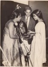 Mrs. Shanti Sengupto presents a trophy to the winner of the ‘Inter-Collegiate Entertainment Competition’ 