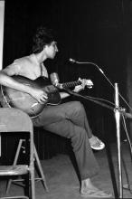 A student performing in a music event during Mardi Gras, 1983