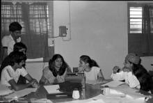 Students engaged in a discussion during Mardi Gras ‘83