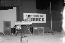 A participant playing a flute during an event at Mardi Gras ‘83