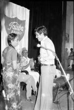 Shahrukh Irani receiving a prize from Dr. Jaya Indiresan during Mardi Gras (1983)