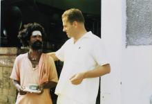 A German staff member with a priest 