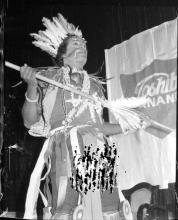 A participant performing in an event during Mardi Gras (1983)
