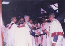 Mr. Jamshed J. Irani is greeted by members of the Senate and the Board of Governors