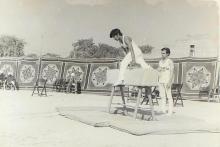 A student participates in a gymnastic activity at the 13th Inter IIT Sports Meet