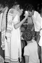 A moment captured during Mardi Gras (1983)