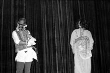Participants performing in a skit during Mardi Gras (1983)
