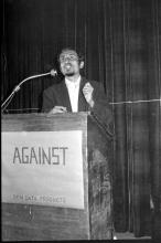 A student participating in the debate competition during Mardi Gras, 1983