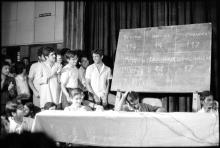 Participants engaging in an event at Mardi Gras ‘83