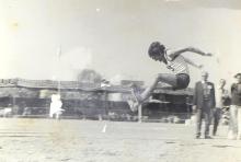 A student participates in the long jump competition at the13th Inter IIT Sports Meet