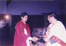 A student receives his degree from the Director, Prof. R. Natarajan
