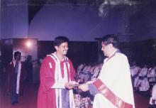 A student receives his degree from the Director, Prof. R. Natarajan