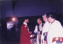 A students receives his award from the chief guest, Mr. Jamshed J. Irani