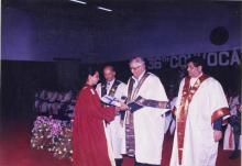 A student receives an award from chief guest, Jamshed J. Irani (Tata Steel)