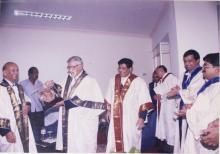 Mr. Jamshed J. Irani with a memento