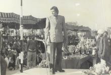 A distinguished guest of the 13th Inter IIT Sports Meet stands on the podium 
