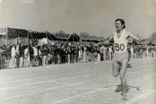 A sprinter/relay racer at the 13th Inter IIT Sports Meet