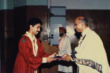 Dr. V. S. Arunachalam presents a degree to a graduand during the 25th Convocation, 1988