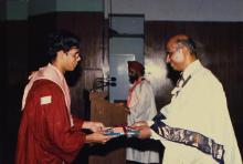 Dr. V. S. Arunachalam presents a degree to a graduand during the 25th Convocation, 1988