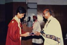 Dr. V. S. Arunachalam presents a degree to a graduand during the 25th Convocation, 1988