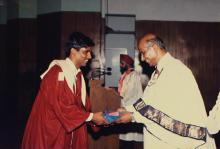 A graduand receives a degree from Dr. V. S. Arunachalam during the 25th Convocation, 1988