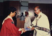 A student receives his degree during the 25th Convocation, 1988