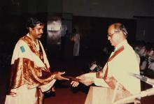 Prof. L. S. Srinath presents a degree during the 25th Convocation, 1988