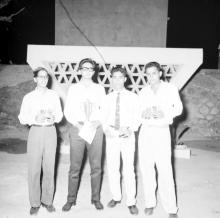 Students standing with their respective trophies, 1963