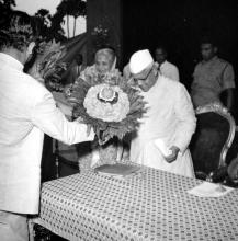 The chief guests are felicitated with bouquets during the Fourth Institute Day, 1963