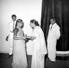 Mrs. Shanti Sengupto gives away a prize during the Fourth Institute Day, 1963