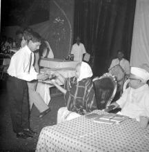 Mrs. Nirmala Medhi presents a prize during the Fourth Institute Day, 1963
