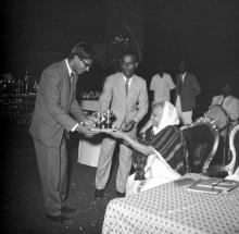 Mrs. Nirmala Medhi gives away a prize to a student during the Fourth Institute Day, 1963 