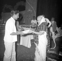 Mrs. Nirmala Medhi gives away a prize during the Fourth Institute Day, 1963