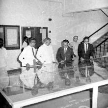Prof. B. Sengupto shows a 3D model of the institute to Mr. V. R. Nedunchezhiyan in the presence of Prof. S. Sampath and Mr. C. V. Sethunathan, 1967 