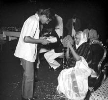 Mrs. Nirmala Medhi gives away a prize to a student during the Fourth Institute Day, 1963
